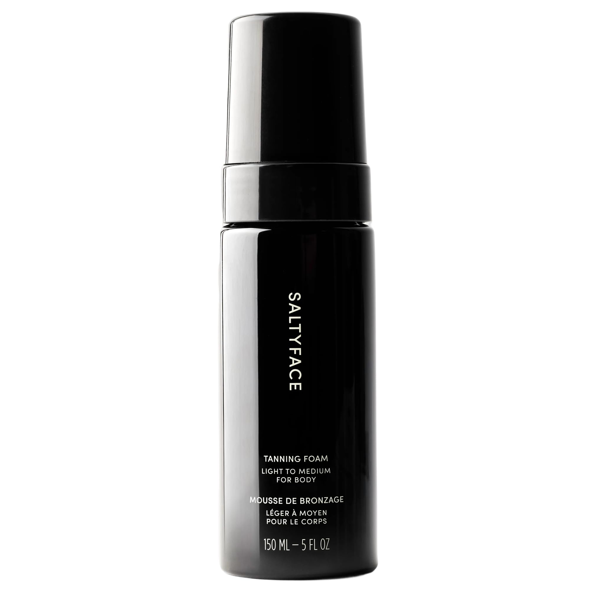 SALTYFACE tanning foam on full body for a natural, transfer-free glow.