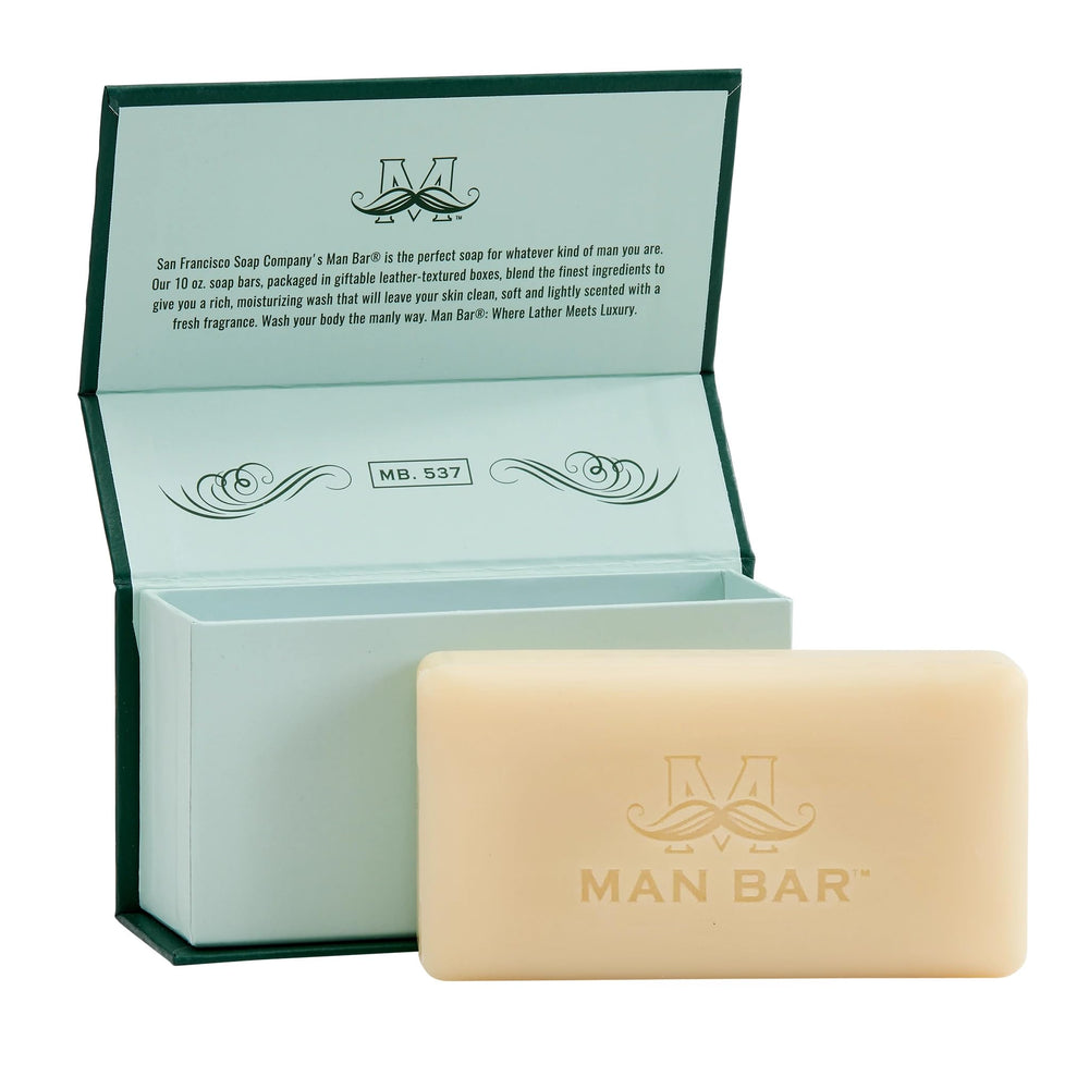 Close-up of Siberian Fir Man Bar texture showing moisturizing cream on skin.