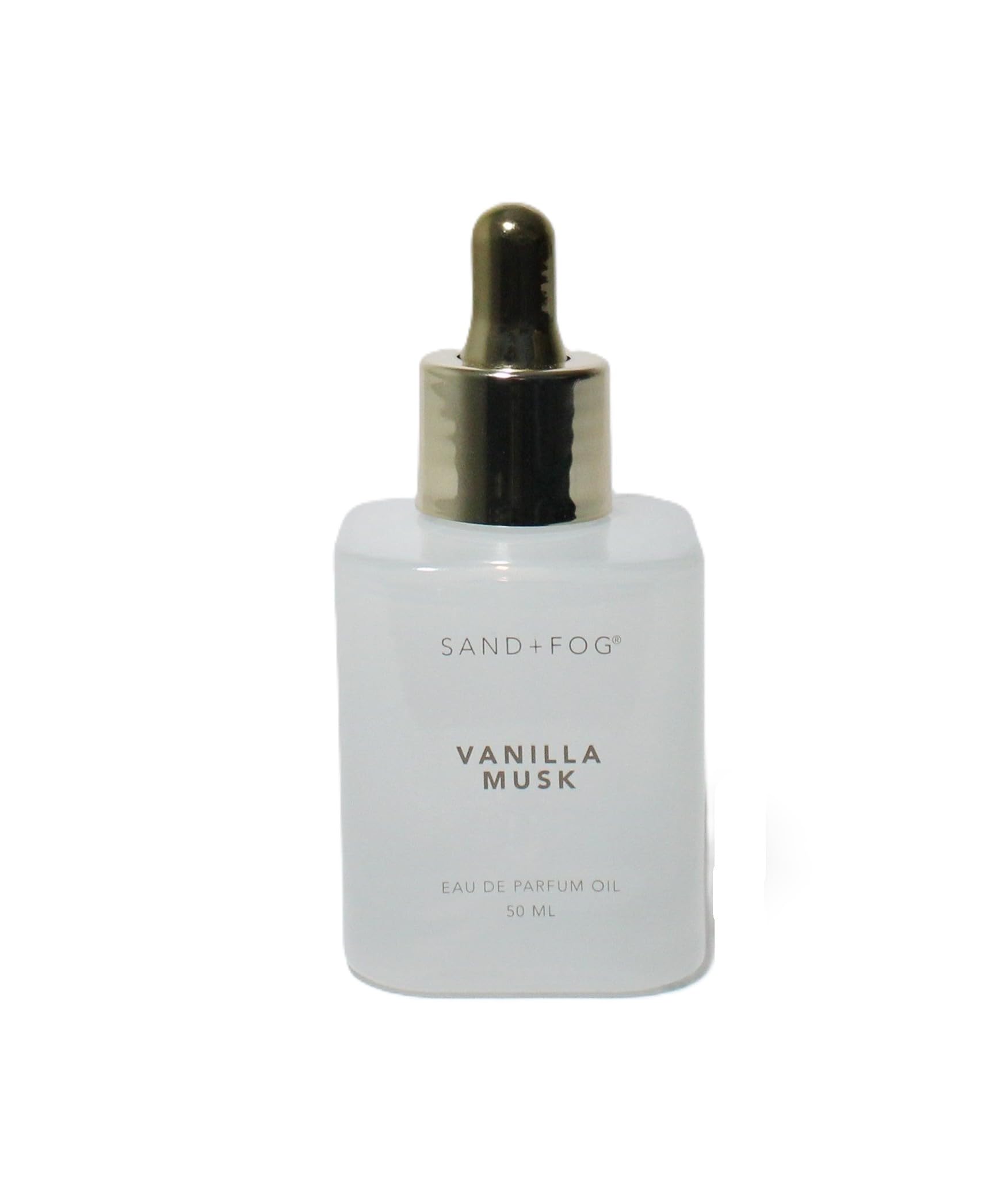 Sand + Fog Vanilla Musk dropper bottle close-up, travel-friendly oil for on-the-go scent.