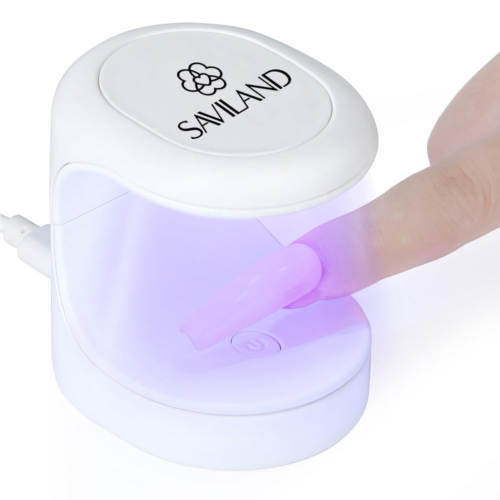 SAVILAND mini UV nail lamp shows one-finger design ideal for quick gel cures on the go