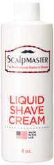 Scalpmaster Liquid Shave Cream bottle on a countertop for smooth scalp shaving
