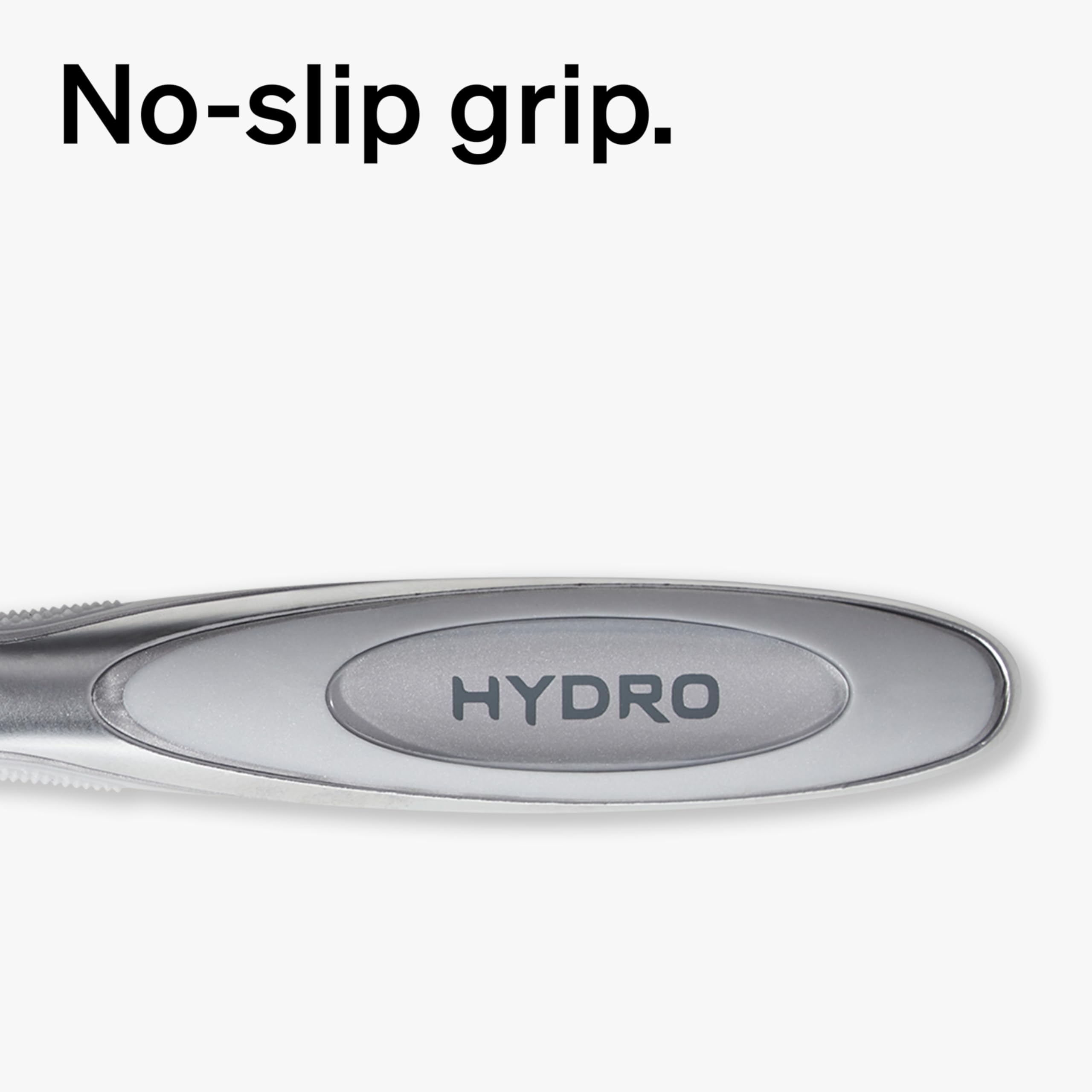 Schick Hydro Dry Skin Shock Absorb handle closeup conveys adaptive pressure during shaving.