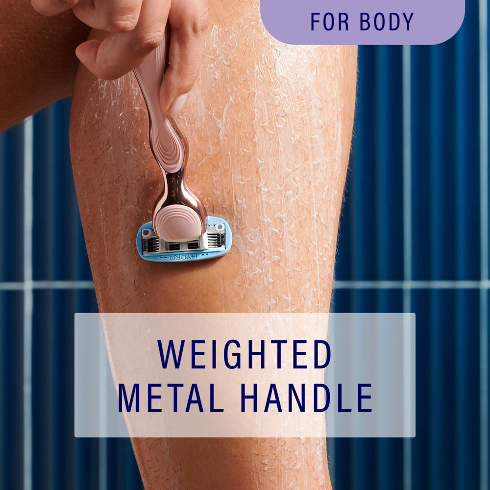 Schick Hydro Silk Rose Gold 5 curve-sensing blades following body contours.