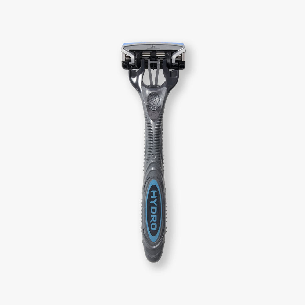 Ergonomic rubber grip on Schick Hydro 5 for controlled shaving.