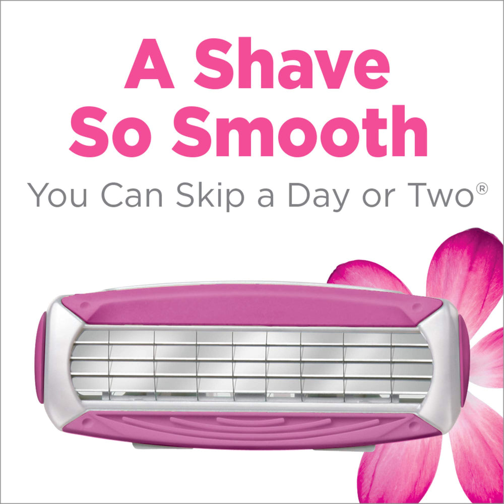 Schick Quattro Womens razor refills four-blade pivoting head close-up, promoting precise contouring.