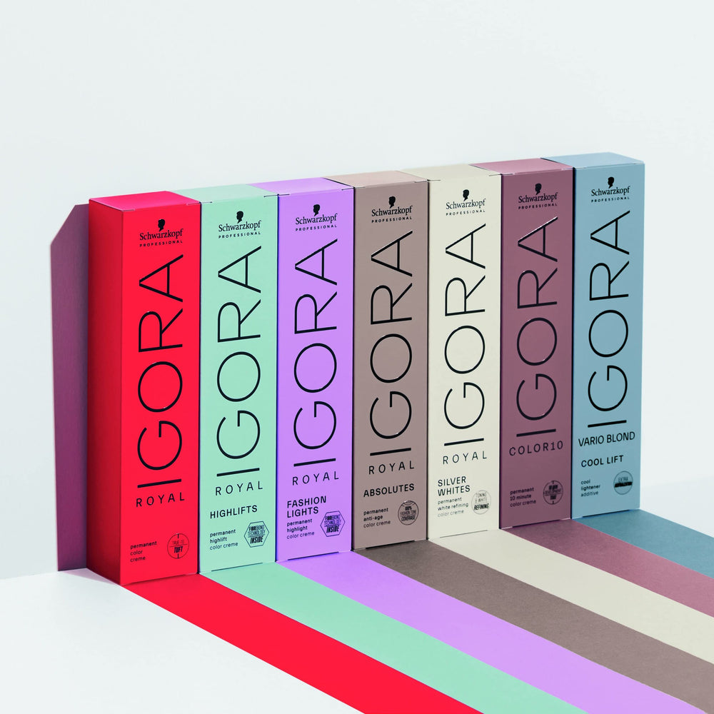 Schwarzkopf Igora Royal Color Creme 6-65 applying in salon for even color on porous hair.