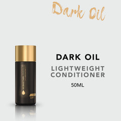 Sebastian Dark Oil application shot demonstrates detangling and smoothness.