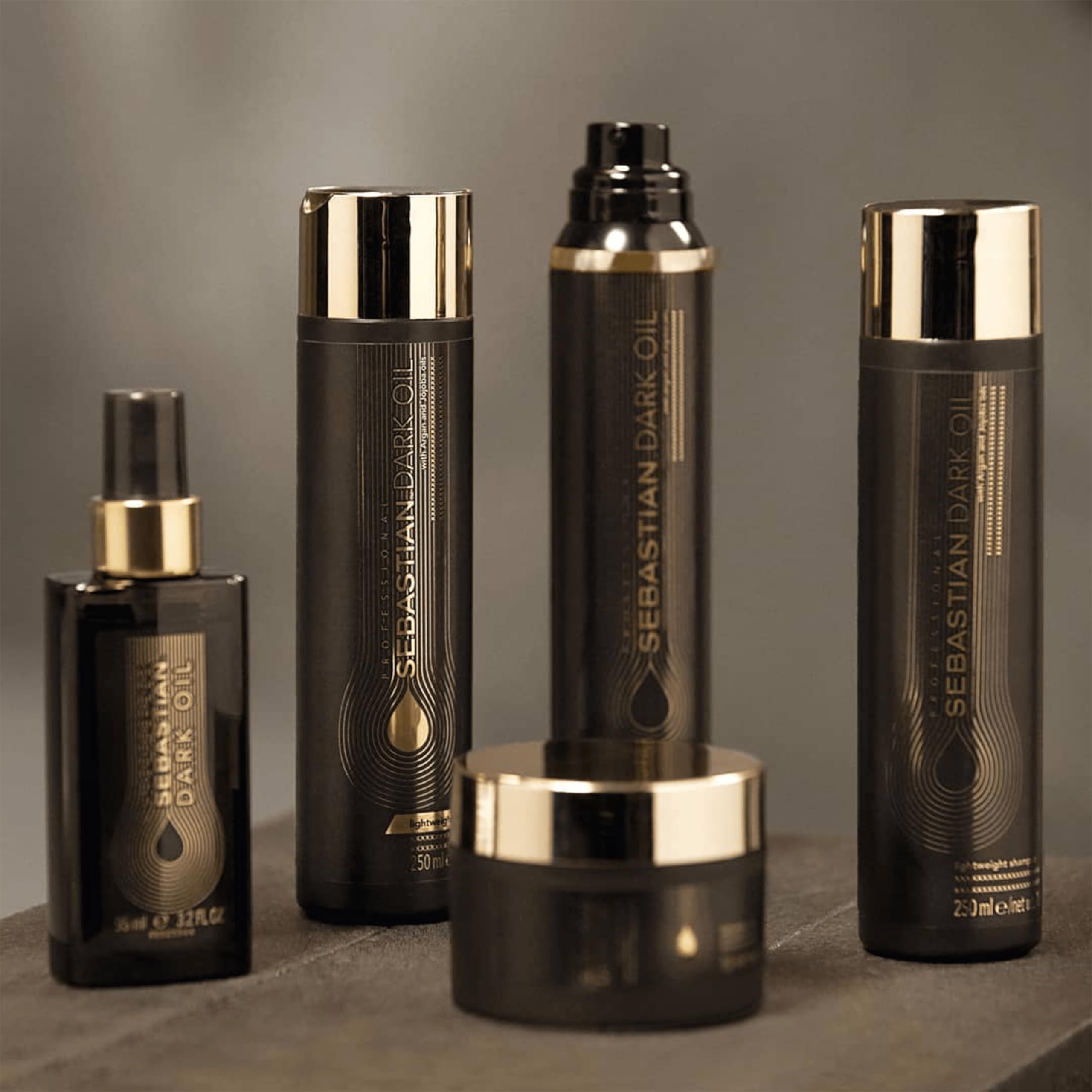 Sebastian Dark Oil Shampoo shelf packaging highlighted in product scene for easy display.