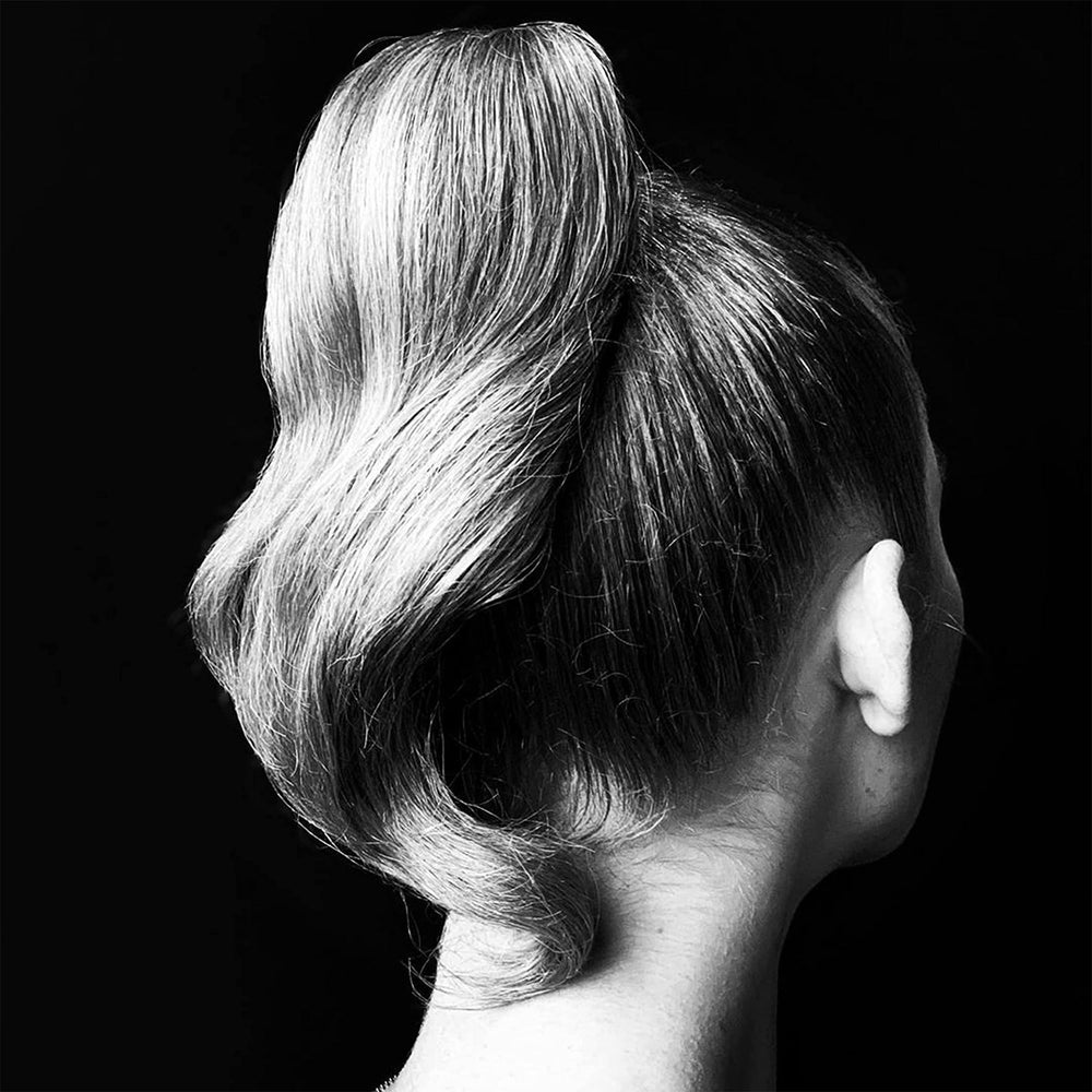 Sebastian Drench demonstrates frizz control for silky, manageable strands