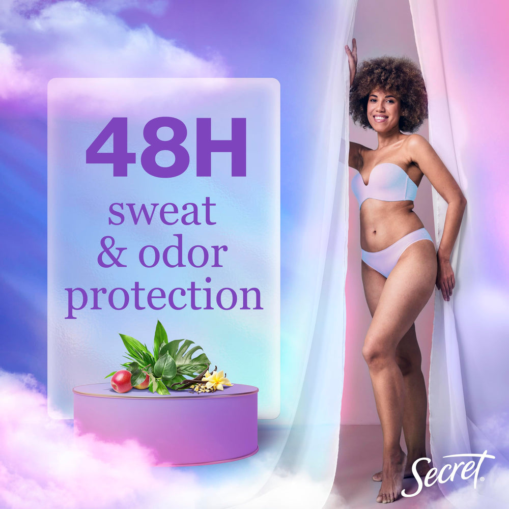 Secret Dry Spray hand-application demonstrates quick on-the-go use.