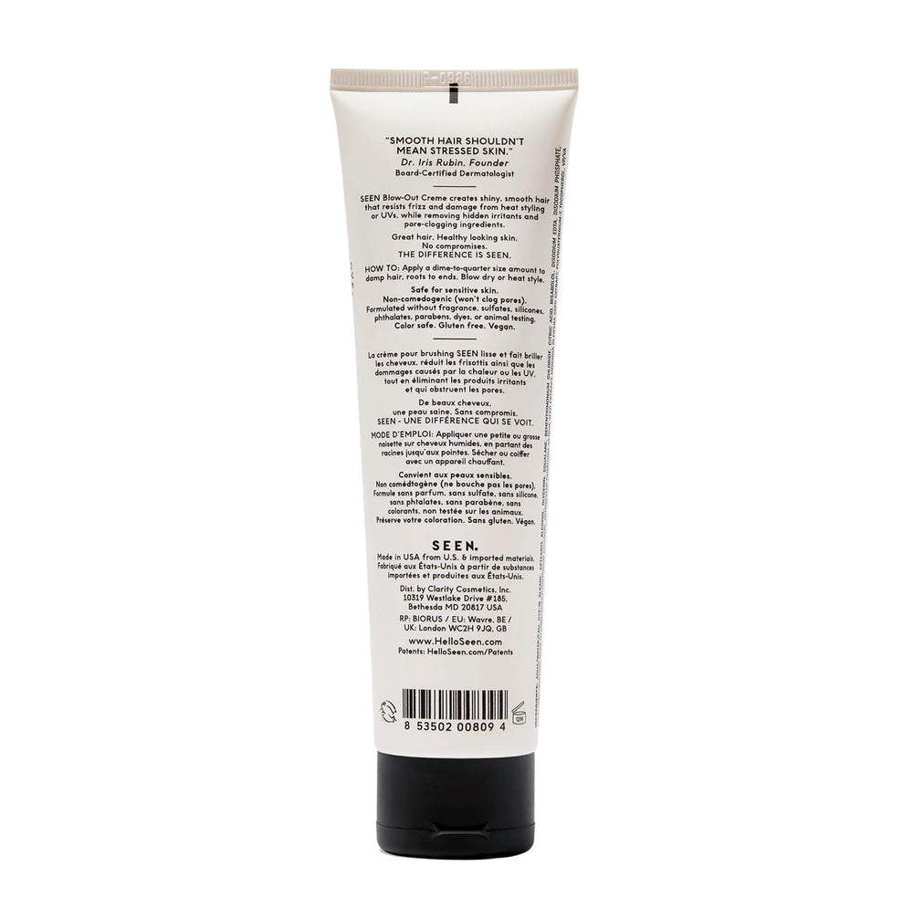 SEEN Blow-Out Creme being applied to hair for frizz control and shine.