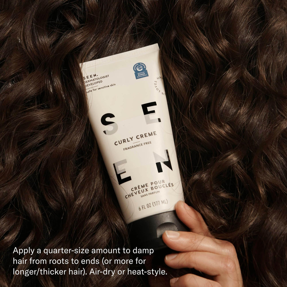 SEEN Curly Creme model close-up showing defined curls and shine