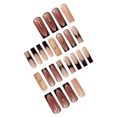 SEENEEY French brown nails with gold charm accents for stylish detail.