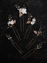 Diseño floral con perlas de SELFCLOUD para peinados románticos