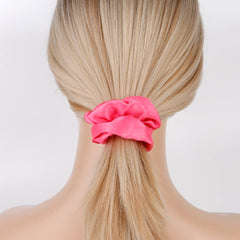 Semato hot pink scrunchies worn during active sports practice