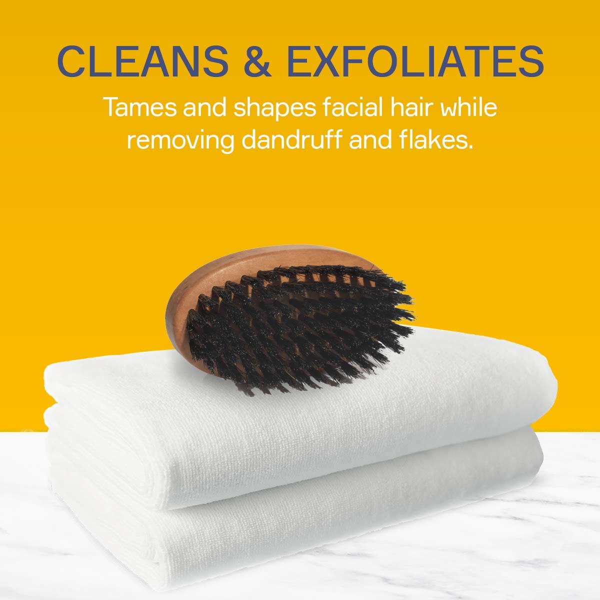 Seven Potions beard brush distributes oils to soften the beard.