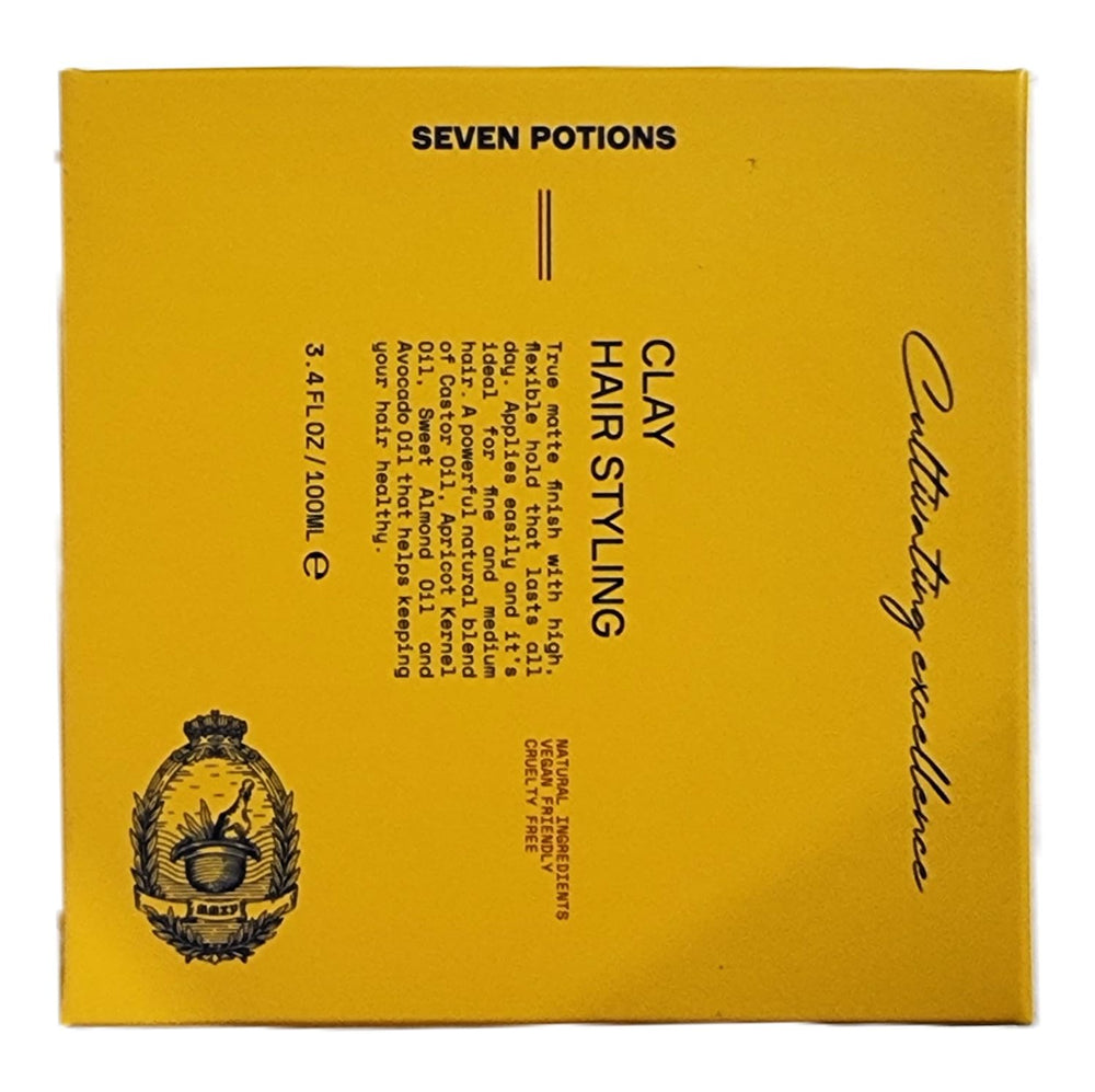 Close-up of Seven Potions Hair Clay showing matte finish texture.