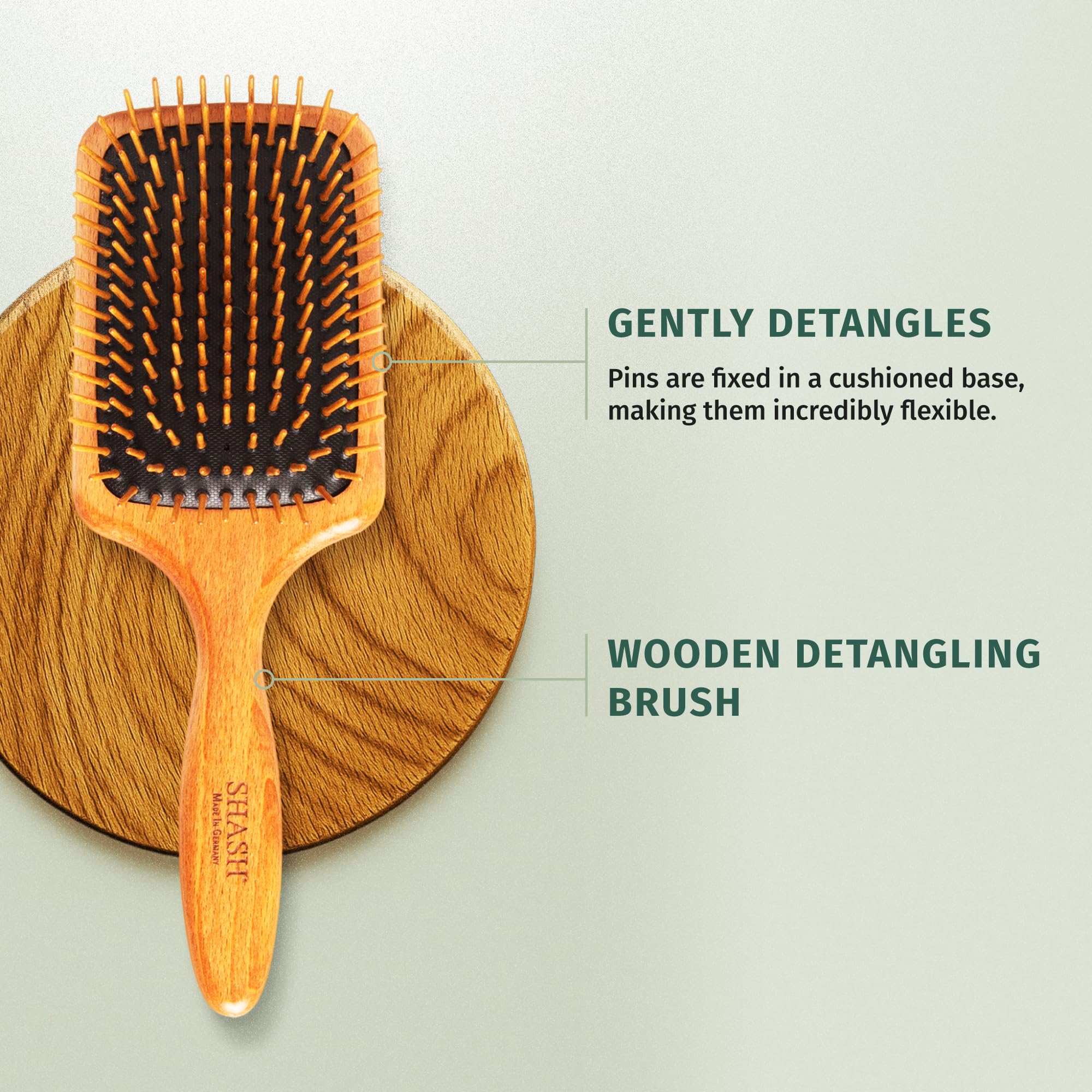 Long pins of SHASH brush glide through strands for easy detangling.