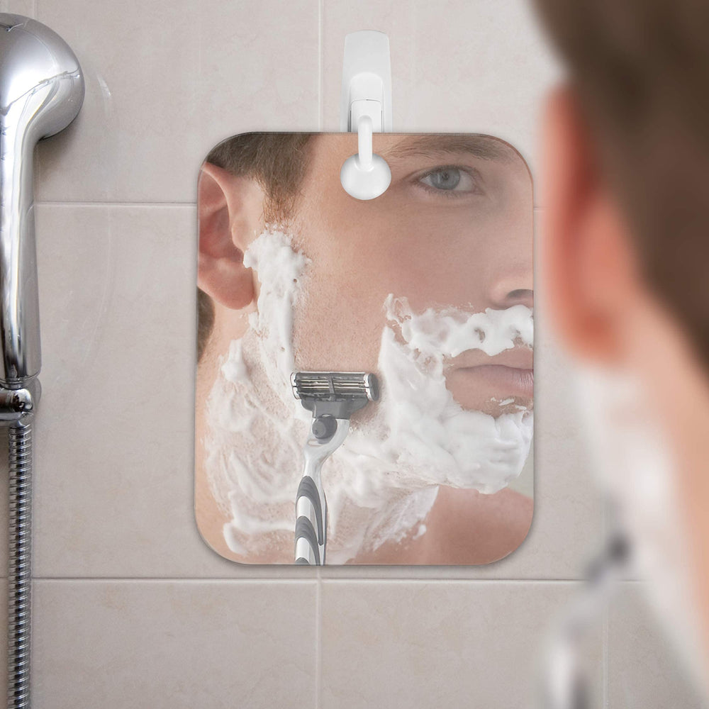 Close-up of the fogless surface showing sharp, steam-resistant reflection.
