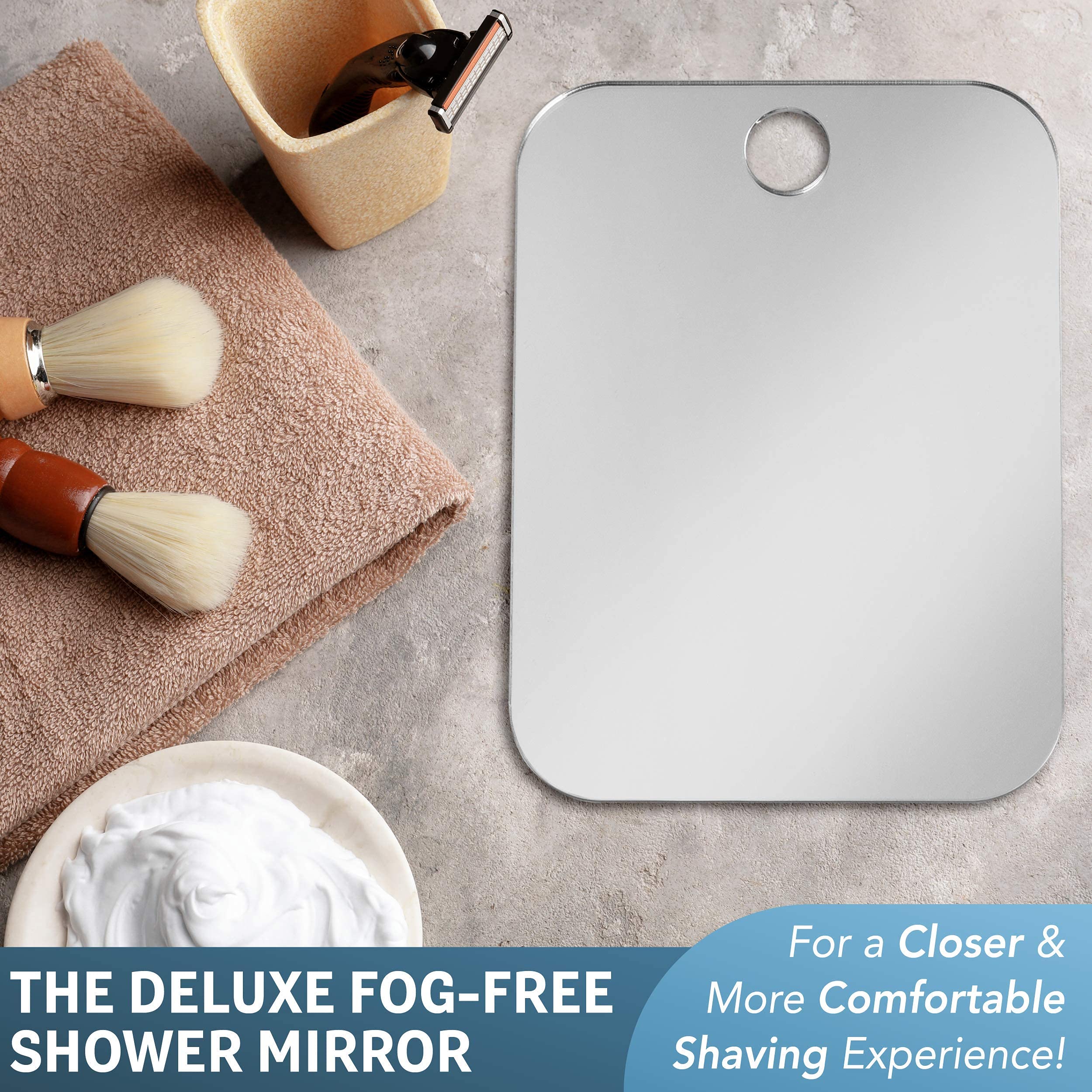 In-shower setup with fogless mirror for a practical grooming routine.