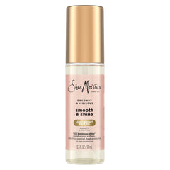 SheaMoisture Aceite Coco Hibisco, bote derramando, aporta hidratación y brillo al cabello.