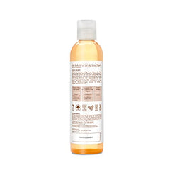 Aplicación de aceite corporal de SheaMoisture: textura ligera que se absorbe rápido.