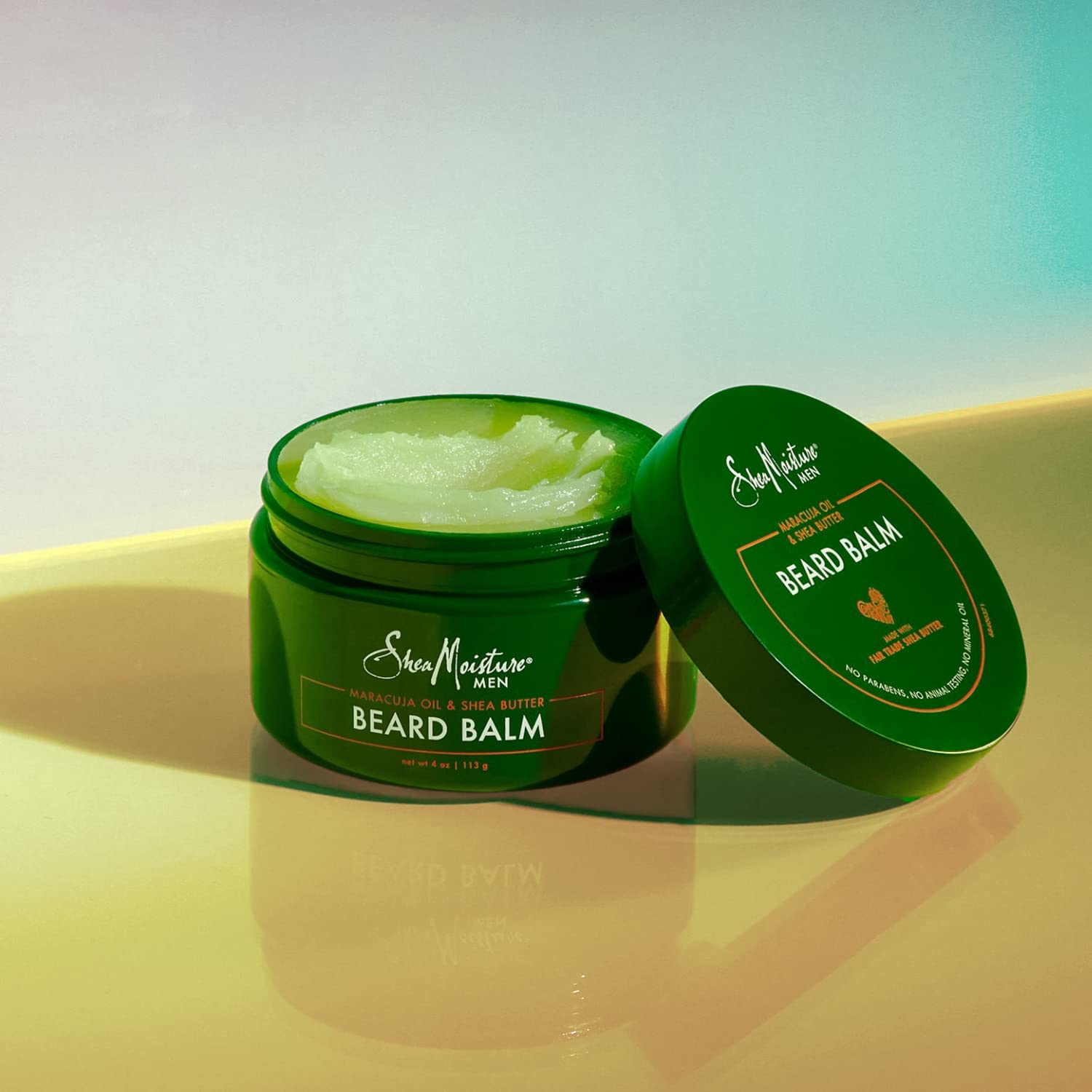 SheaMoisture balm being applied to beard demonstrates smoothing texture and reduced tangles.
