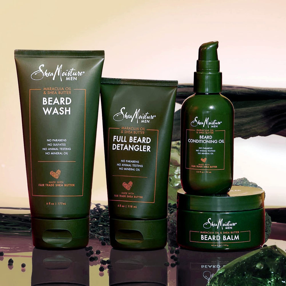 SheaMoisture beard care scene with green plants suggests natural, tidy grooming routine.