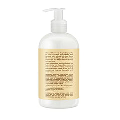 SheaMoisture Baby Acondicionador con manzanilla y argán en frasco, hidrata delicadamente.