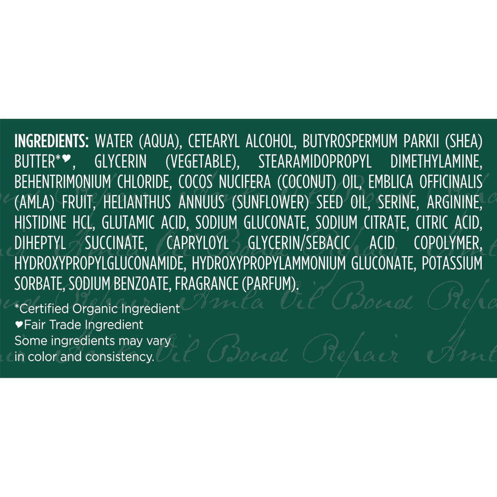 Hair section applying SheaMoisture Bond Repair Masque for deep conditioning