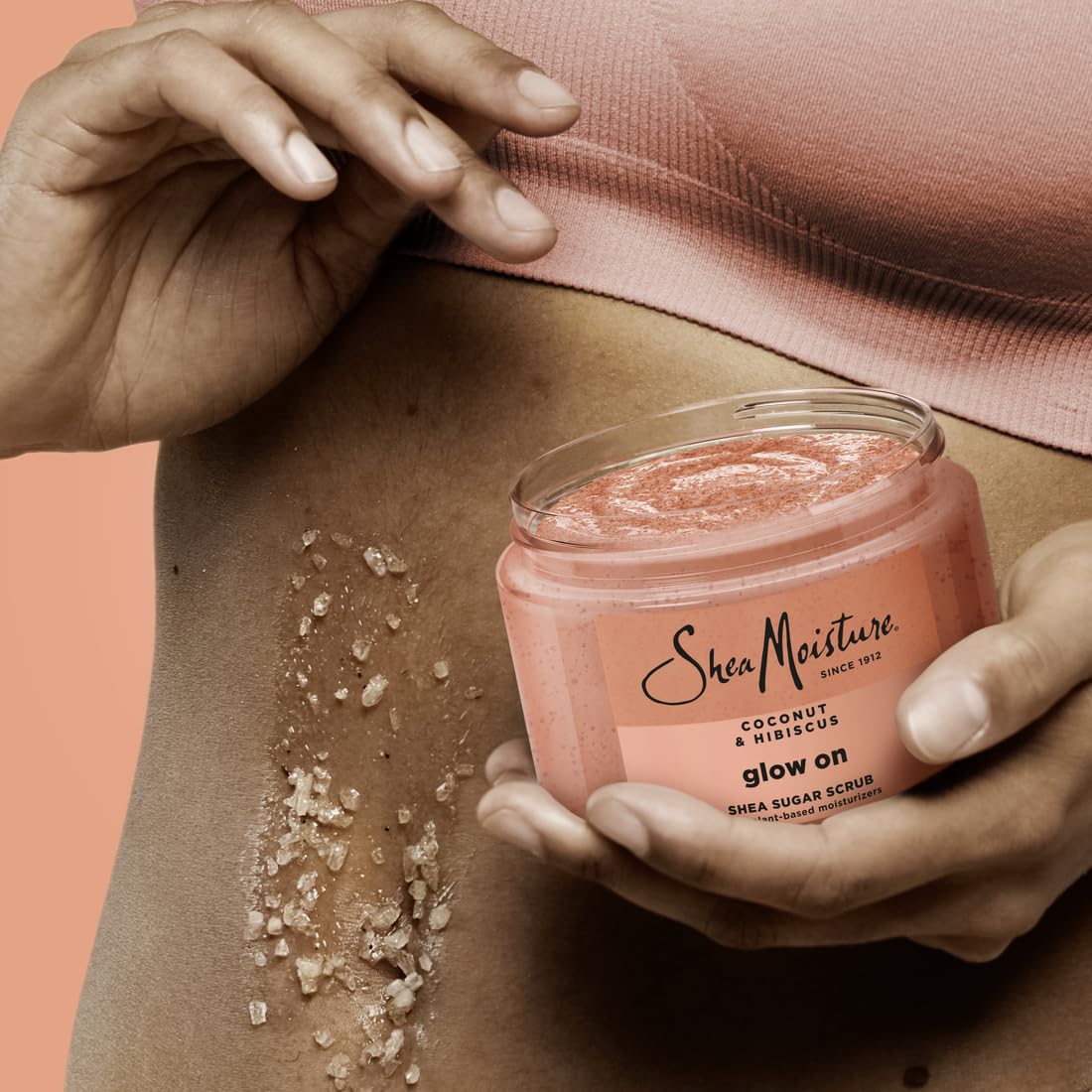 Botella SheaMoisture Brillo Radiante para uso diario