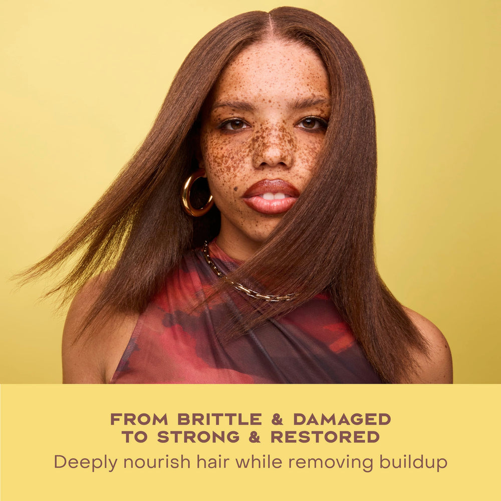 SheaMoisture champú, aplicación diaria para fortalecer el cabello.