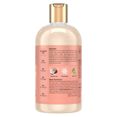 SheaMoisture Coco Hibisco champú, espuma cremosa sobre cabello rizado, limpieza suave y humedad preservada.