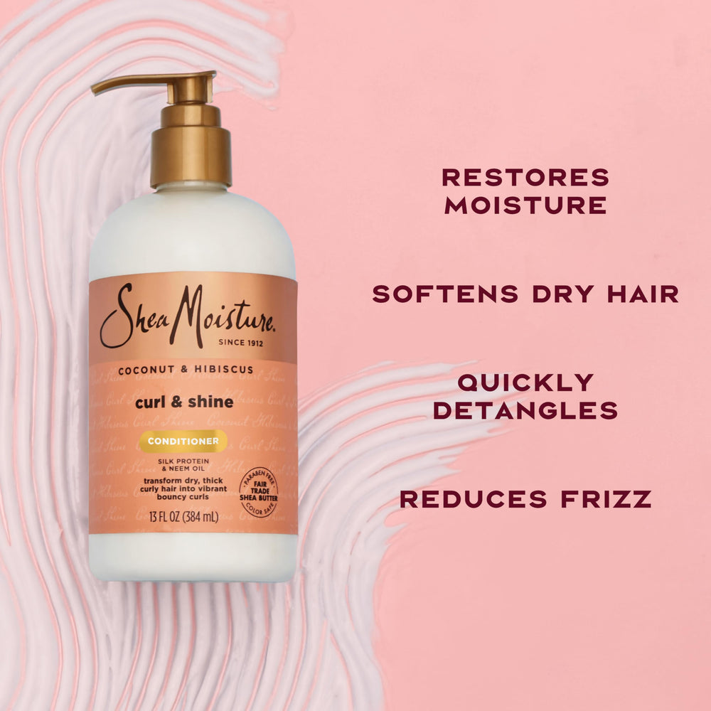 Deslizamiento suave en cabello mojado con SheaMoisture Coco Hibisco.