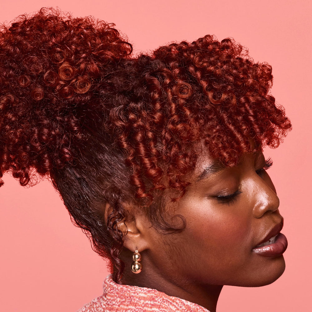 SheaMoisture fair trade shea butter packaging reflects ethical care.