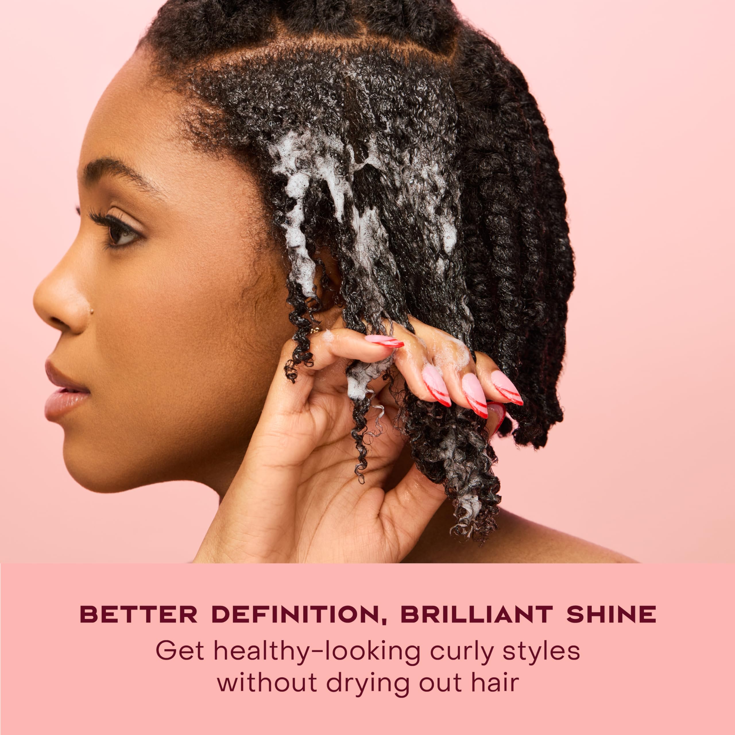 Frizz-free finish and defined curls from SheaMoisture Curl Mousse.