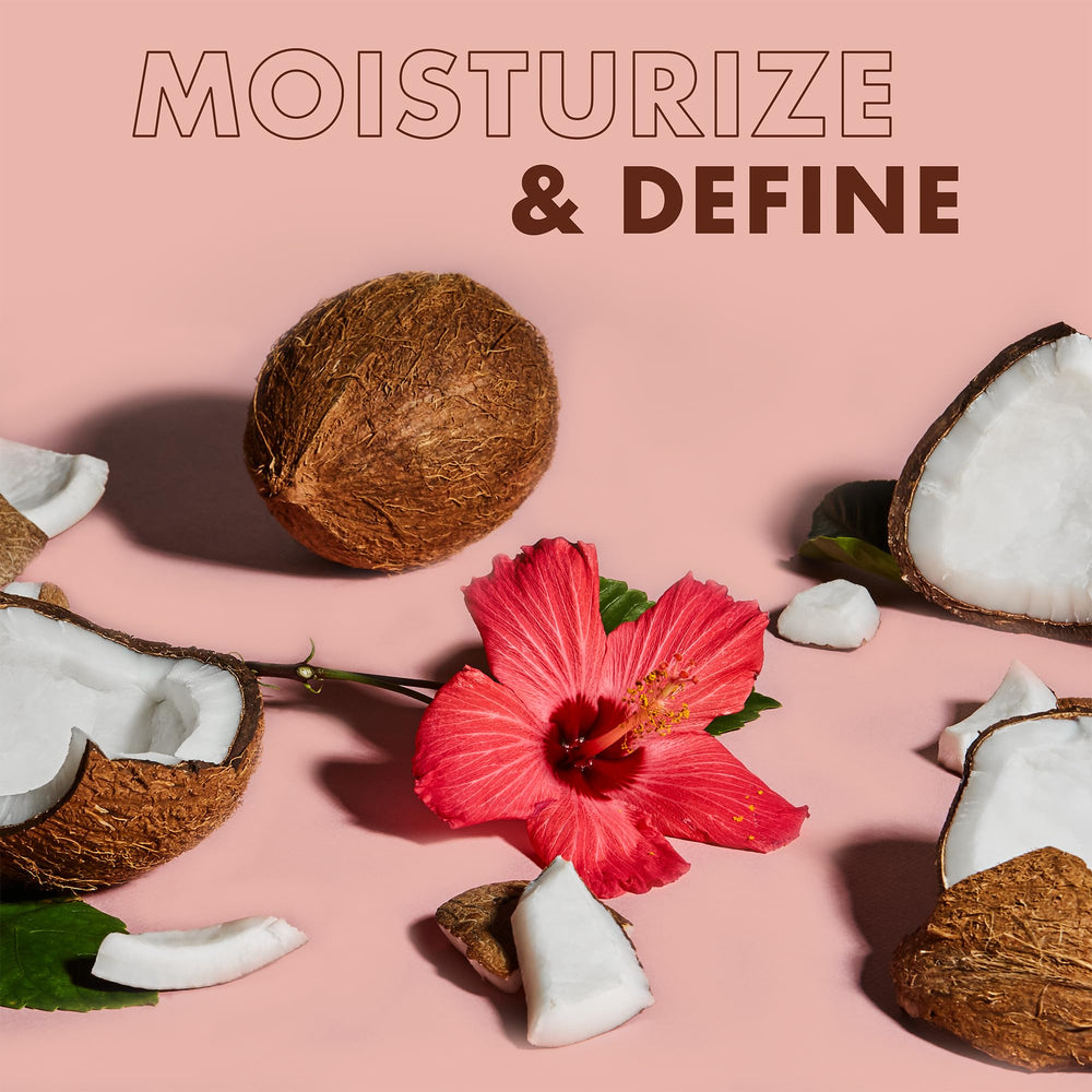 SheaMoisture Hold & Shine Moisture Mist spray locks in shine and frizz control.
