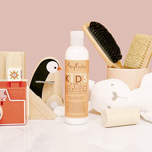 Rizos definidos y suaves con SheaMoisture Desenredante Infantil.