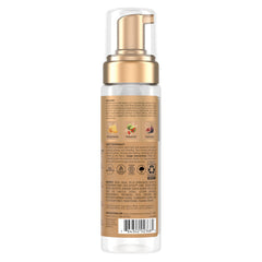 SheaMoisture Wrap & Set Mousse, hidratación suave que deja el cabello sedoso.