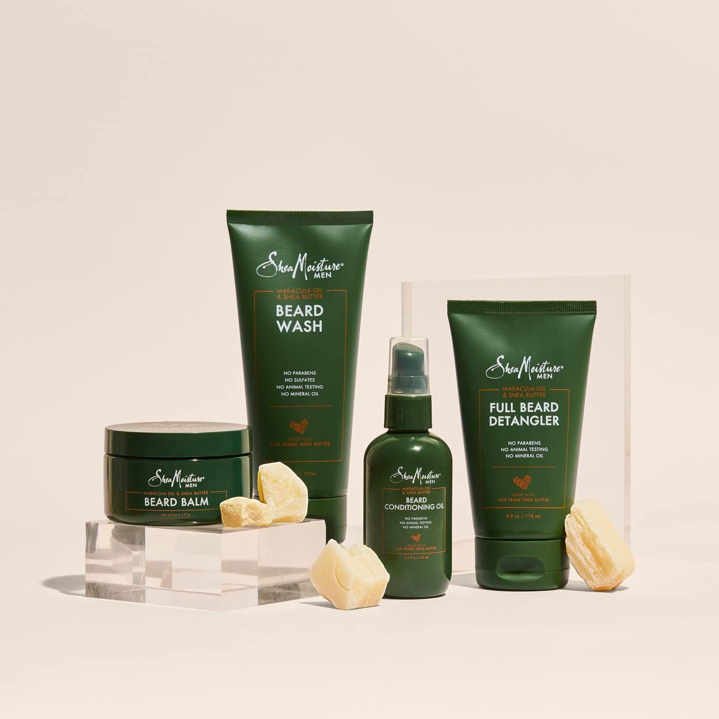 SheaMoisture packaging with oil droplets conveys premium, cruelty-free formula for sensitive skin.