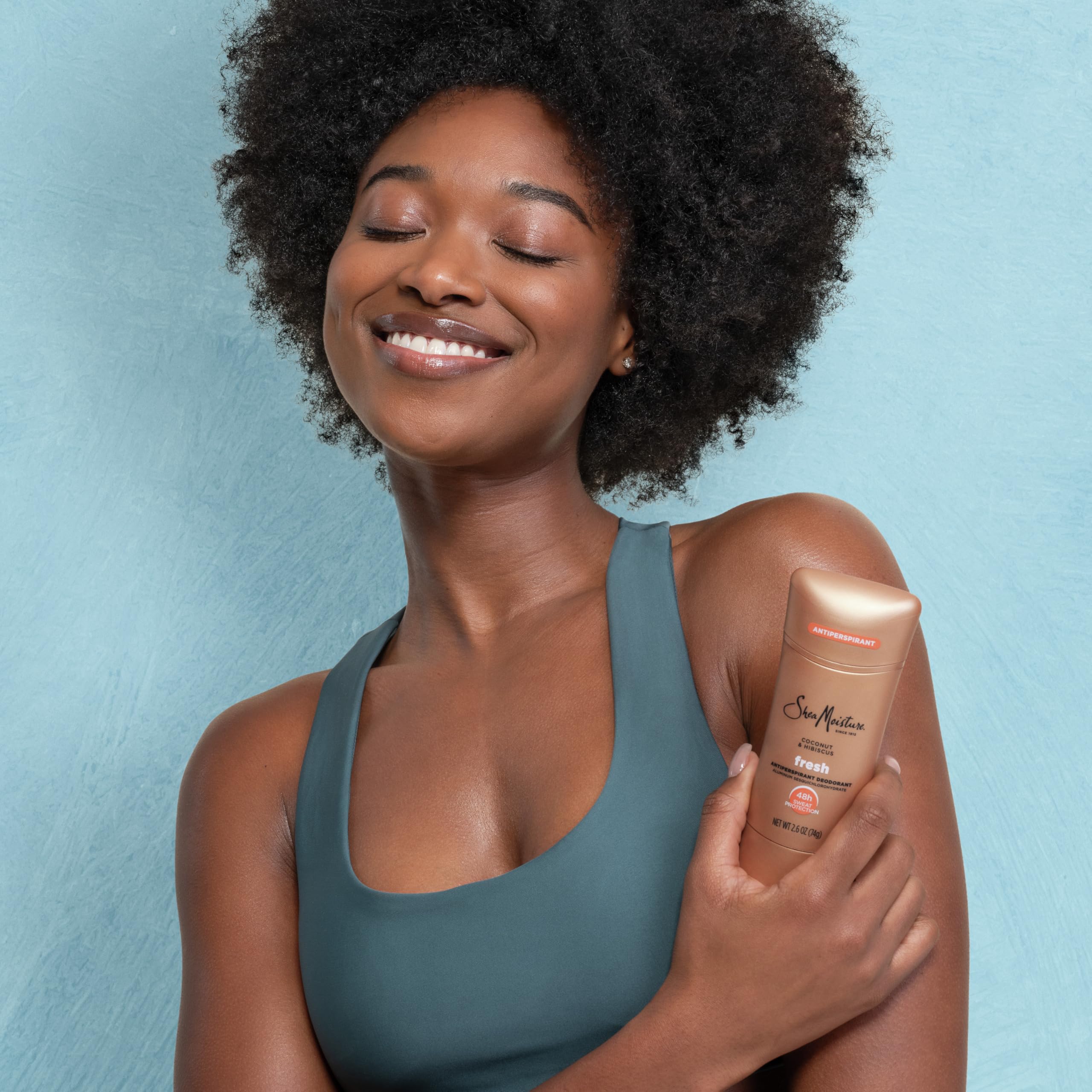 Packaging highlighting fair trade shea butter and coconut hibiscus ingredients.