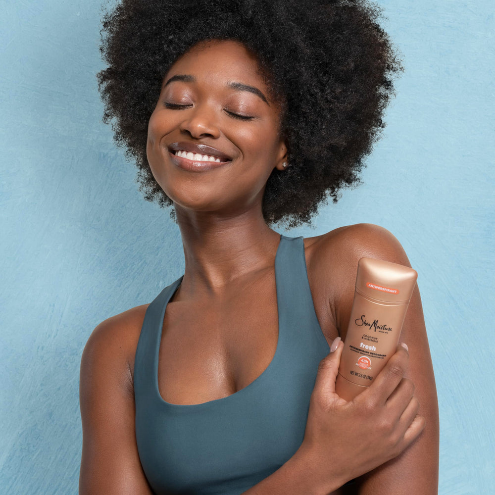 Packaging highlighting fair trade shea butter and coconut hibiscus ingredients.