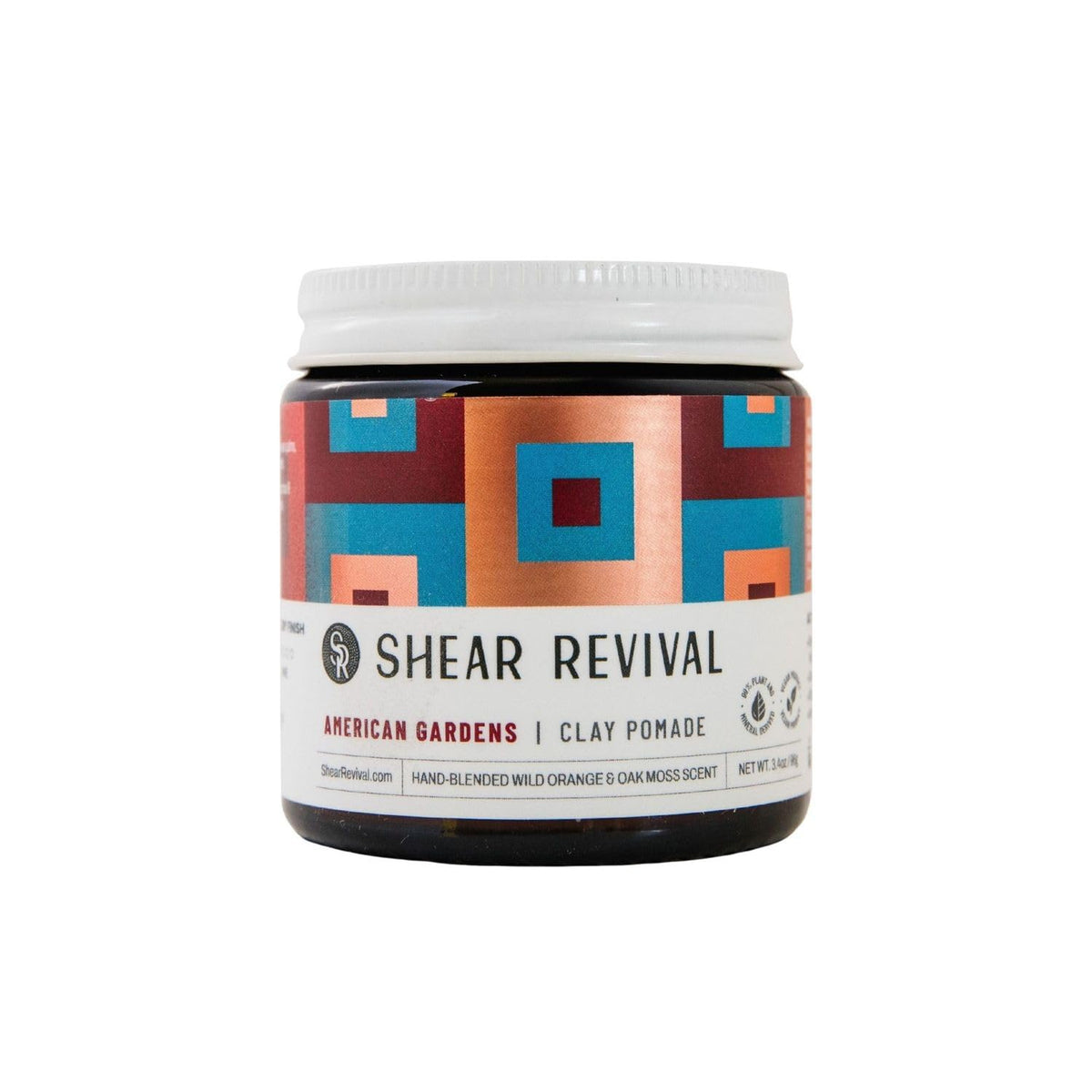 Shear Revival American Gardens Clay Pomade packaging in an amber jar highlights eco-friendly packaging