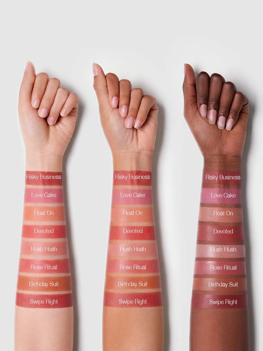 SHEGLAM Color Bloom Dayglow liquid blush on fingertip showing hydrating formula