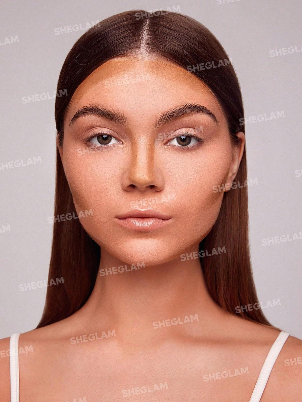 SHEGLAM Snatch 'n' Define contour stick demonstrates nose contour definition.
