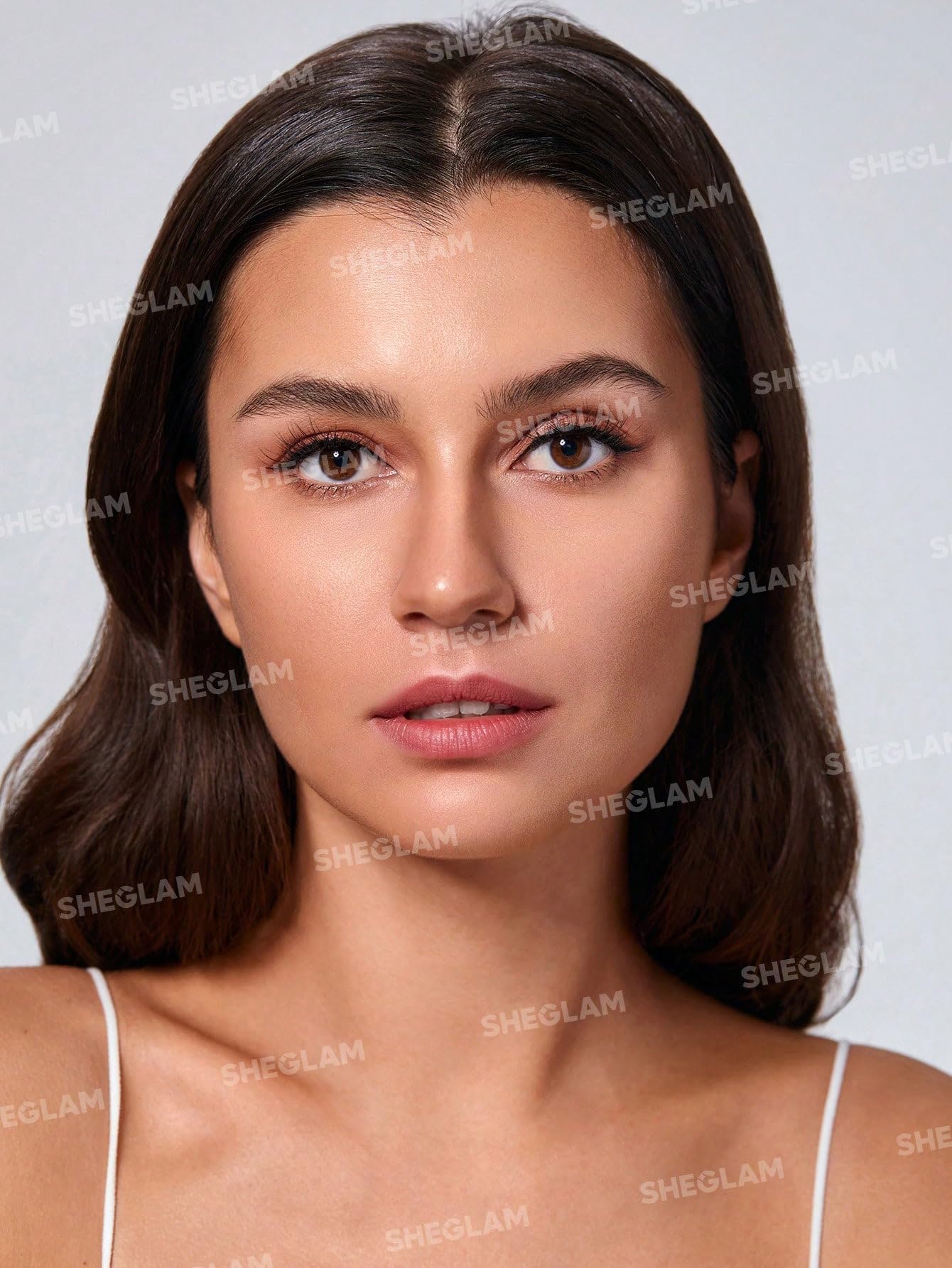 SHEGLAM contour stick application on cheeks and forehead for easy layering