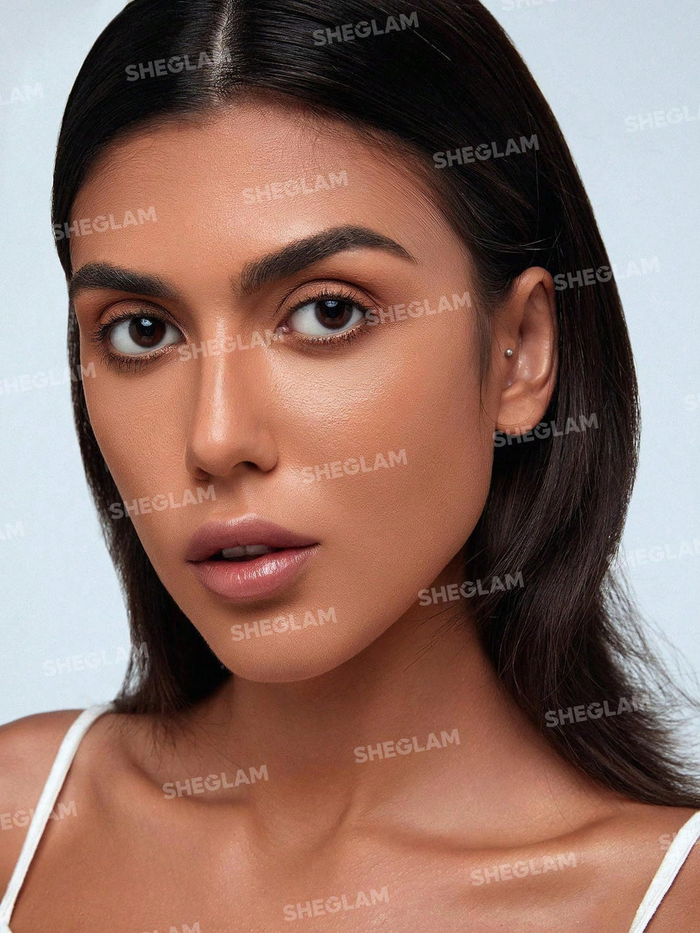 SHEGLAM Snatch 'n' Define texture closeup highlights smooth, streak-free formula.