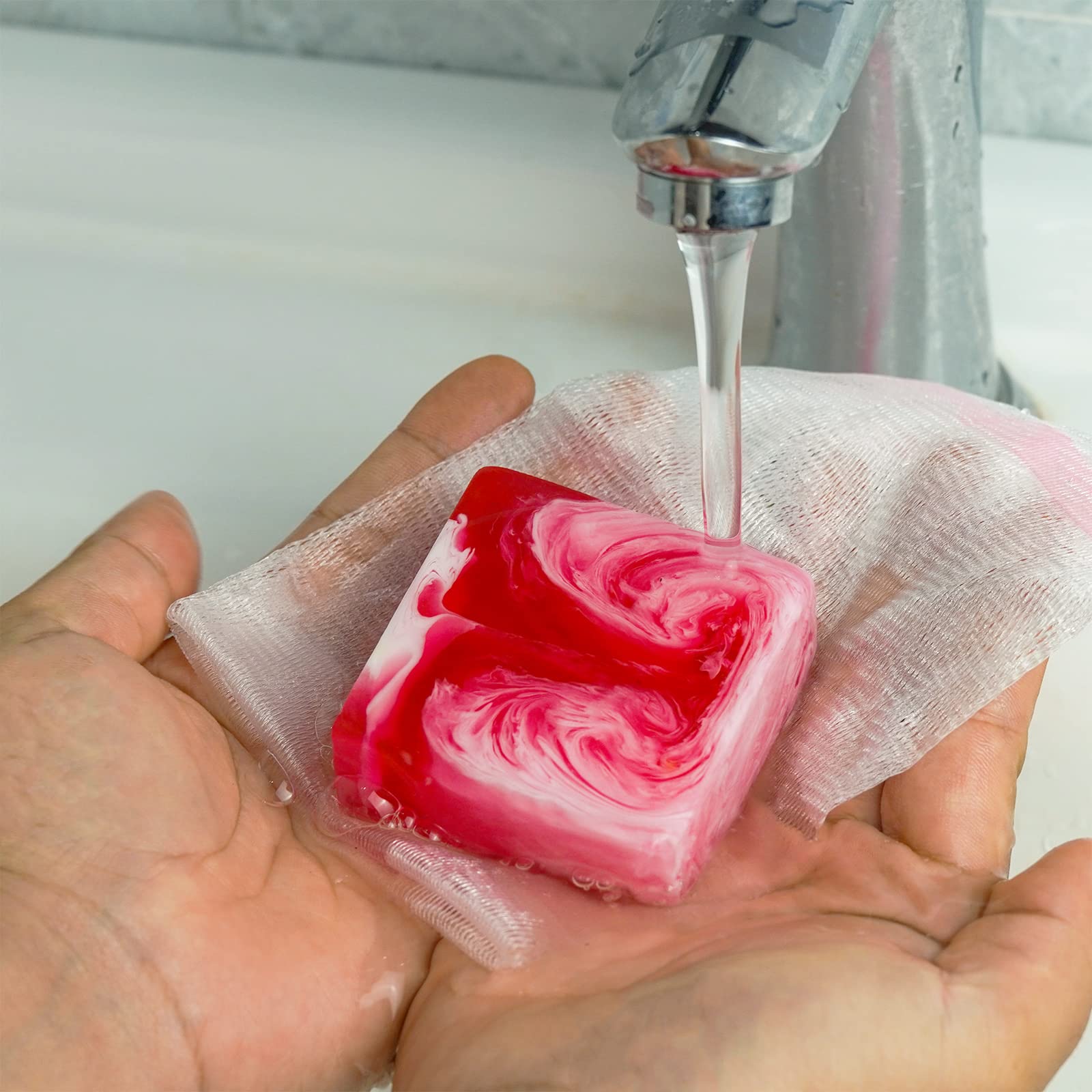 Shibarcle Yoni Soap on a bathroom shelf in soft light.
