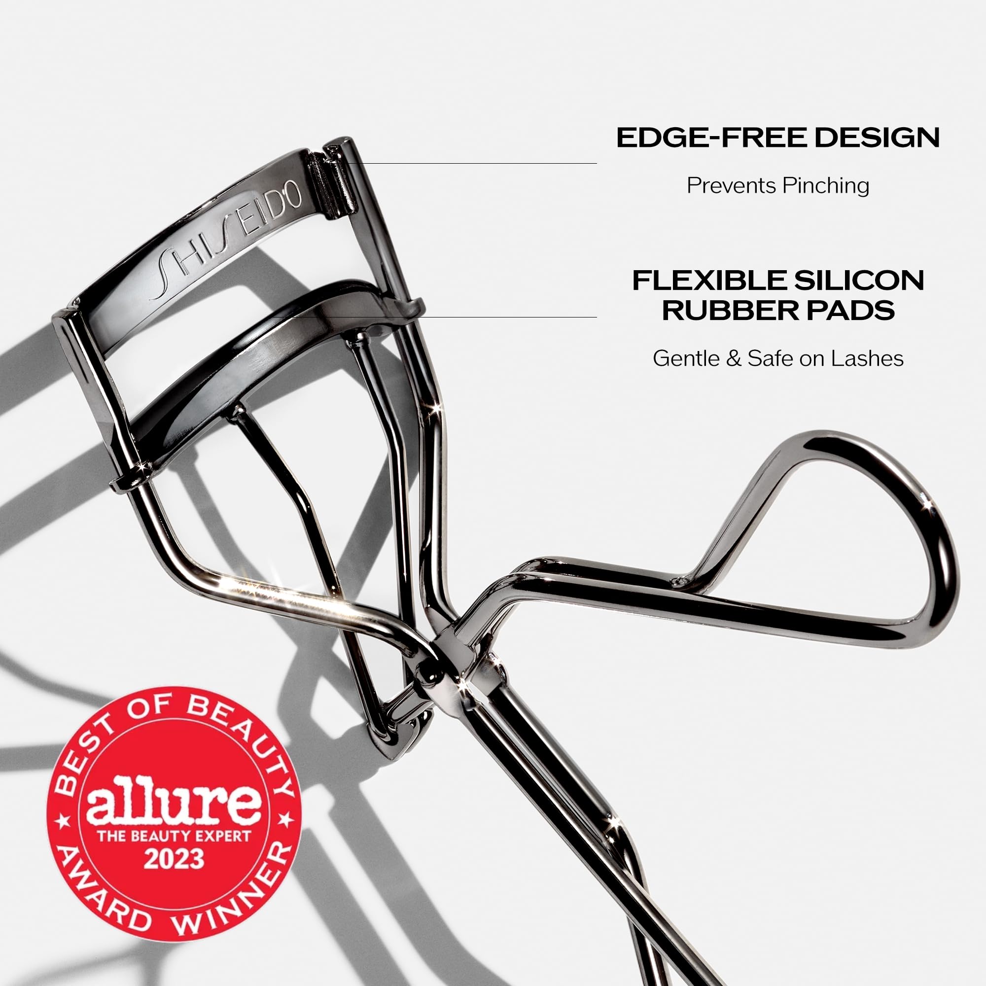 Shiseido Eyelash Curler silicone pads offer gentle protection and lash support.