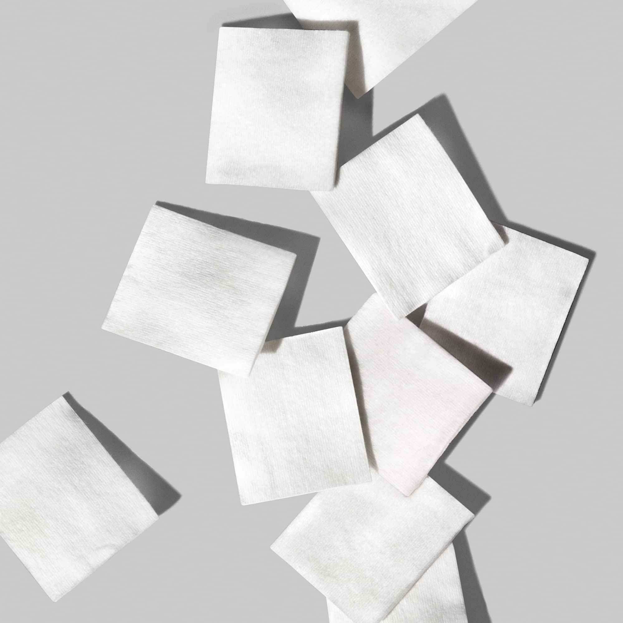 Shiseido facial cotton pads made from 100% natural cotton for softness.
